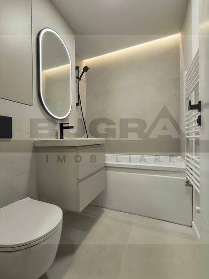 Garsoniera lux, 28mp, balcon, etaj intermediar, parcare, zona centrala