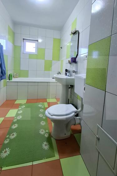 Apartament luminos cu balcon generos, etaj 1 – zona Popăuți