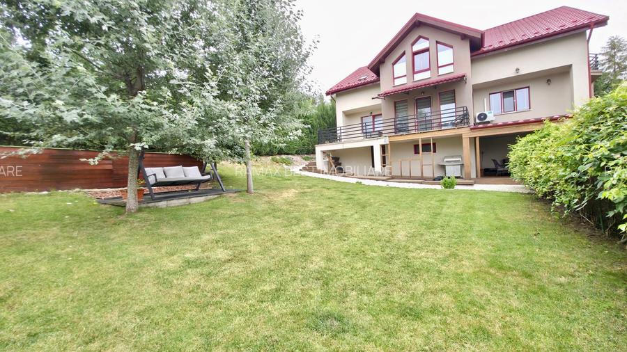 Casă individuală cu 4 dormitoare, grădină 850 mp și garaj dublu - 24
