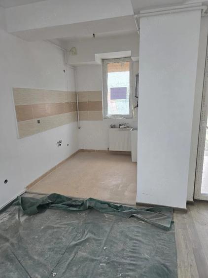 De vanzare apartament 2 camere bloc NOU Tractoru, cu loc de parcare