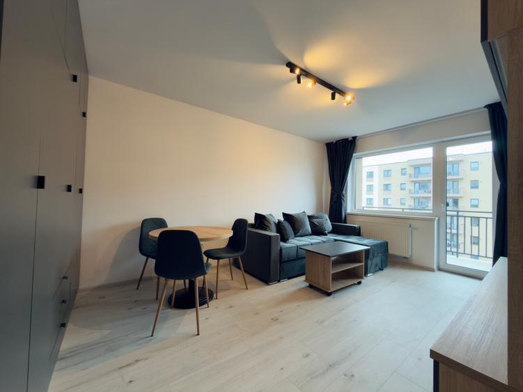 Apartament cu 2 camere de vanzare in zona Tractorul mobilat ,nou in garantie