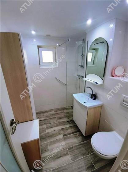 Apartament renovat cu 3 camere 2 bai si pivnita in Sibiu