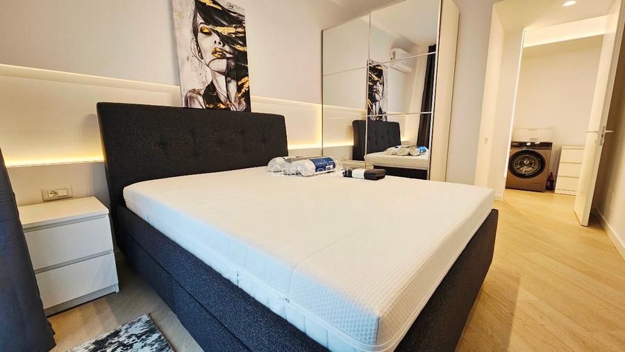 Ofer spre închiriere apartament 2 camere decomandat plus loc parcare subteran  - 4