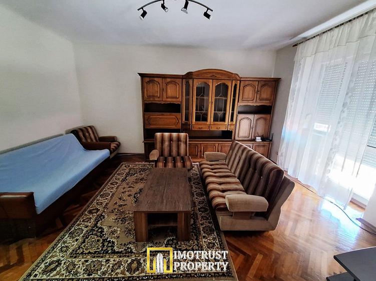 Apartament cu loc de parcare și grădină proprie - de închiriat