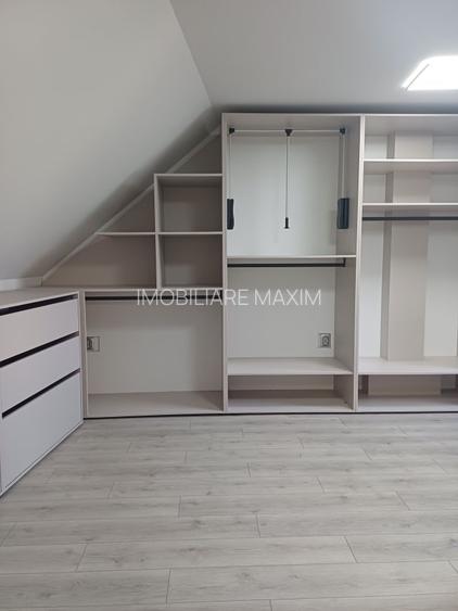 Casa cu un design contemporan si tehnologie integrată - 10