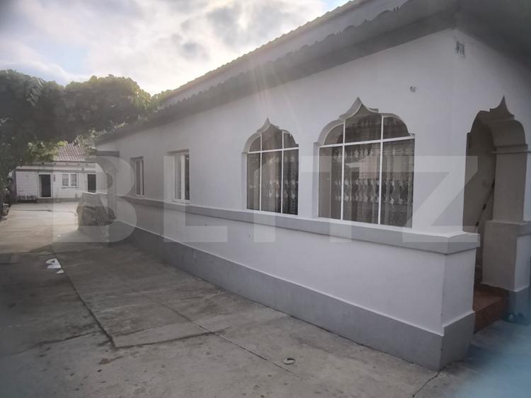 Casa de vanzare, 397 mp teren, zona Romanesti