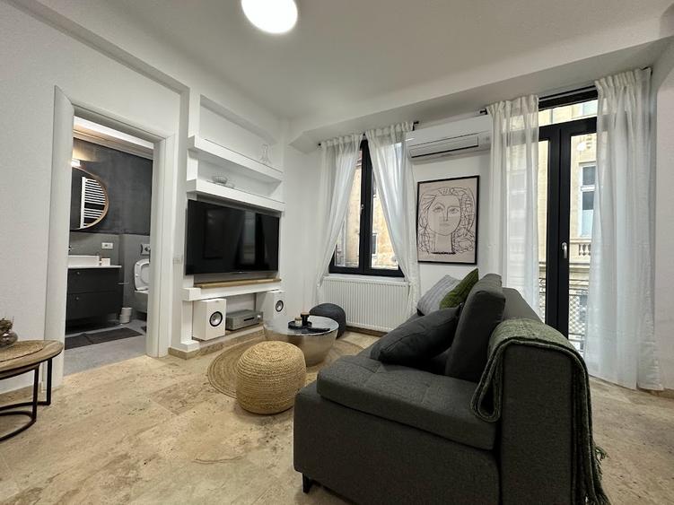 In the center, on a quiet pedestrian street, fully equipped, 2 amazing rooms