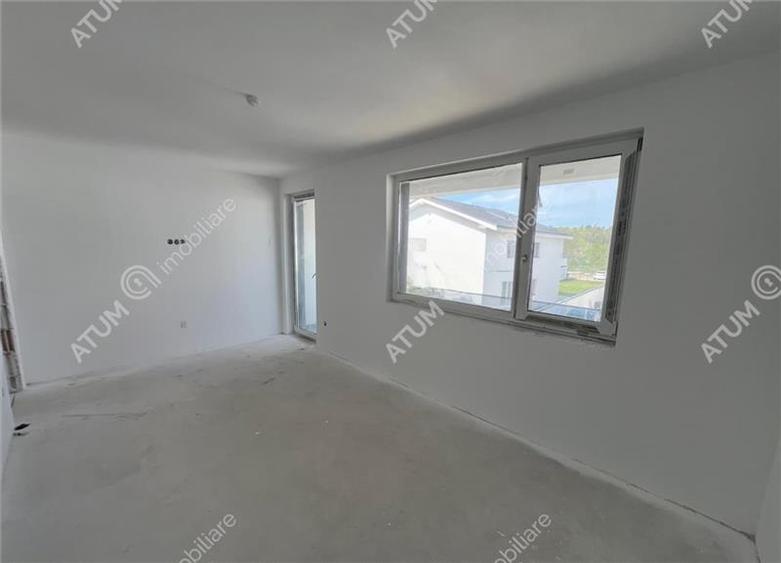 Casa cu 4 camere 2 bai curte de 50 mp zona Calea Cisnadiei Sibiu