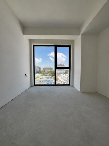 Finalizat | Apartament pe plaja cu vedere la mare în imobil premium