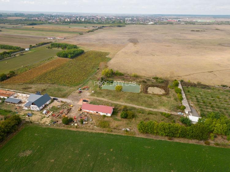 Casă cu teren 13 418 mp intravilan