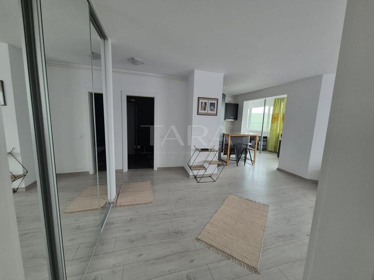 Apartament modern cu birou și panoramă deschisă – zona BMW.