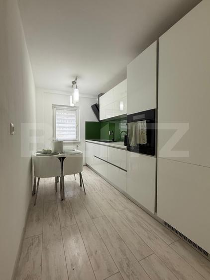 Apartament 3 camere, 2 bai, decomandat, etaj intermediar, boxa