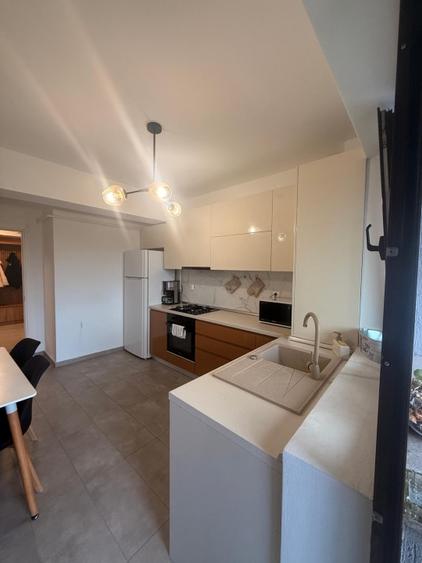 Apartament 3 camere + loc de parcare