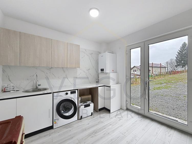 Casa noua cu 3 dormitoare + living, curte generoasa, in Gilau