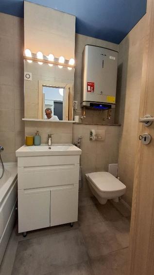 Garsoniera Lux - Amenajata cu stil, ofera confort si utilitate.