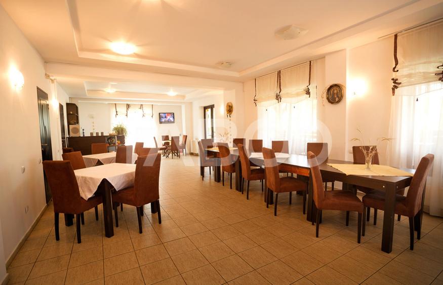 Pensiune 13 camere 16 bai sauna piscina si teren 1565 mp Cisnadioara