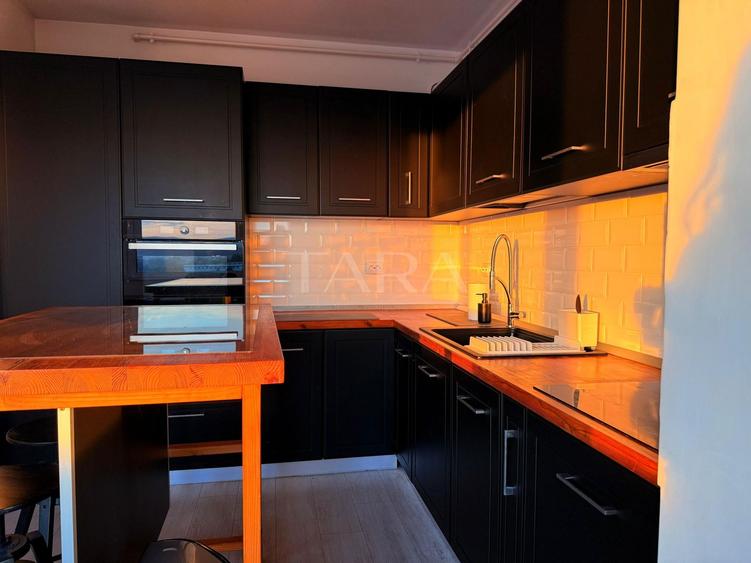 Apartament modern cu birou și panoramă deschisă – zona BMW.