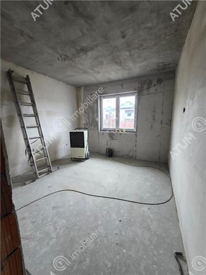 Casa individuala cu 4 camere si curte libera de 340 mp in Cisnadie