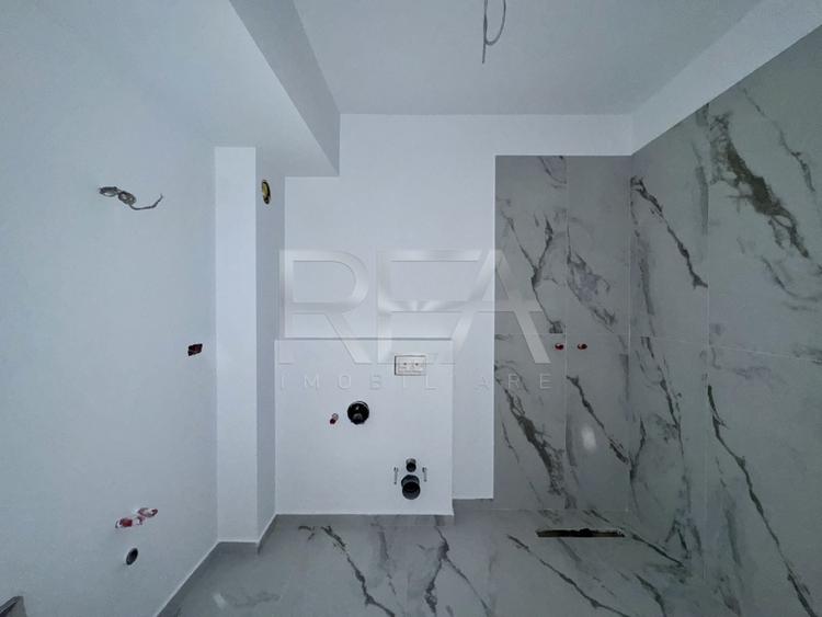 2 camere 60 mp Ultracentral bloc boutique