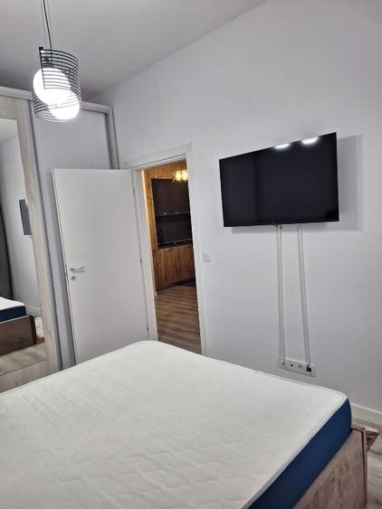 Apartament 2 camere cu terasa proprie și loc de parcare