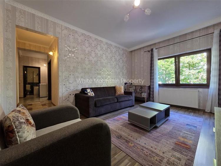 Apartament central cu acces la gradina si 2 locuri parcare - 24