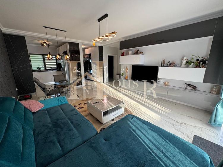 Duplex pe Parter.Mobilat si Utilat complet.Teren generos