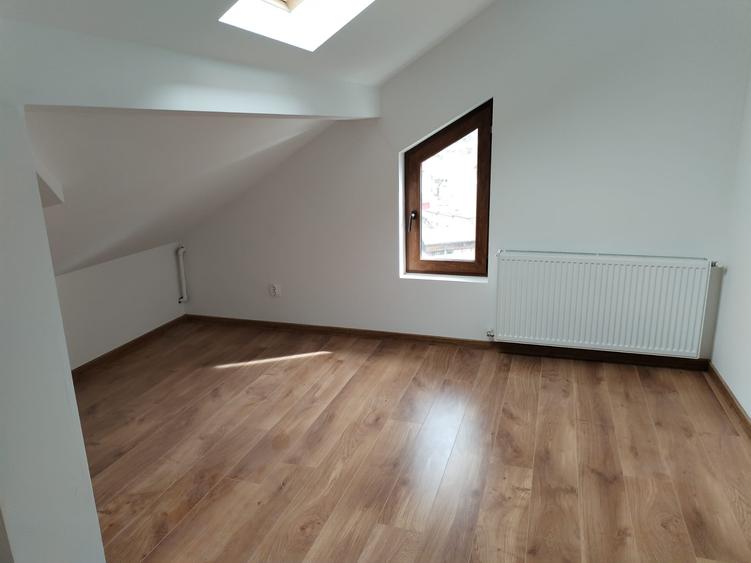 Apartament la mansarda vedere deosebita