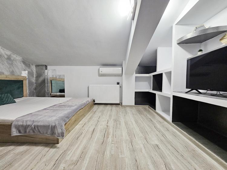 Apartament 2 camere + pod amenajat, in folosinta exclusiva.