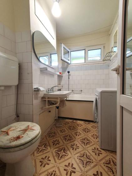 Apartament luminos cu vedere spre biserică, într-un cartier verde și liniștit.