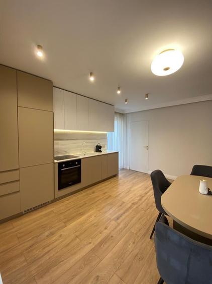 Apartament nou, amplasat într-un imobil premium, parcare, Central
