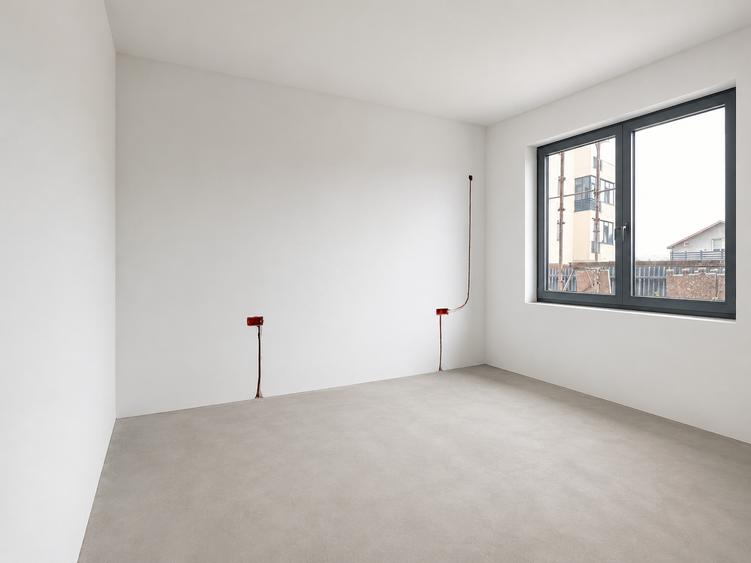 Apartament cu 2 camere, grădină proprie de 60 mp și loc de parcare inclus