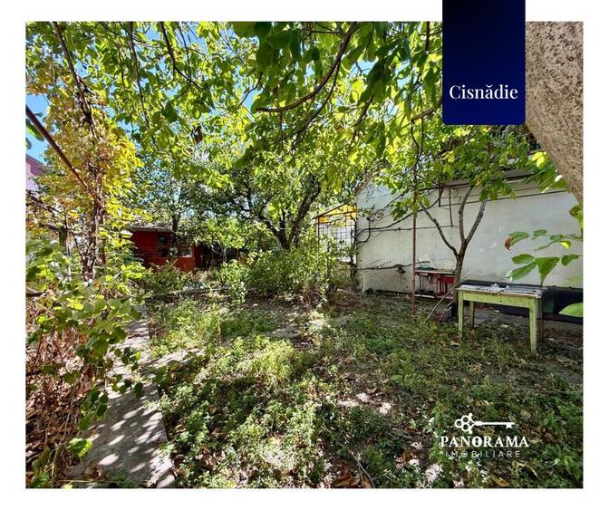 Casă cu grădină proprie, garaj, pivniță și teren în centrul Cisnădiei
