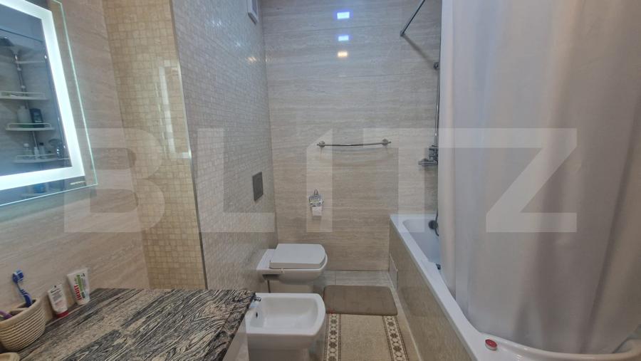 Apartament 3 camere decomandat , 2 bai ,105 mp cu balcon, Tractorul bloc nou