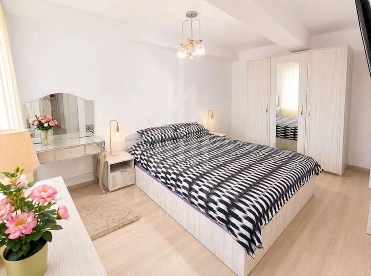 Apartament 3 camere cu 2 băi, 2 locuri de parcare și 2 balcoane