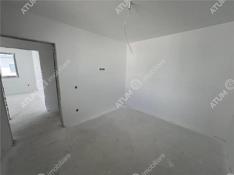 Casa cu 4 camere 2 bai curte de 50 mp zona Calea Cisnadiei Sibiu