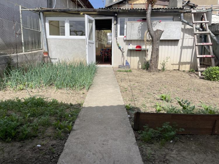 ZONA CENTRALA-CASA 4 CAMERE SUPRAFATA UTILA 89 MP. panouri fotovoltaice