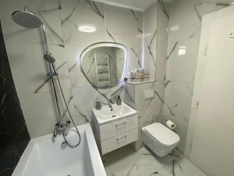 Casa renovata 250 mp utili si teren 935 mp in zona centrala Cisnadie