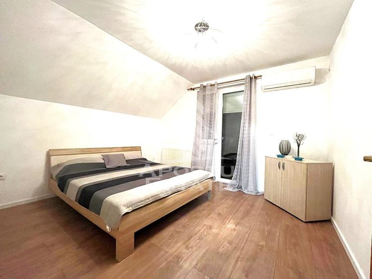 Casa individuala cu 6 camere, 3 bai, garaj, teren 500 mp si 2 fronturi