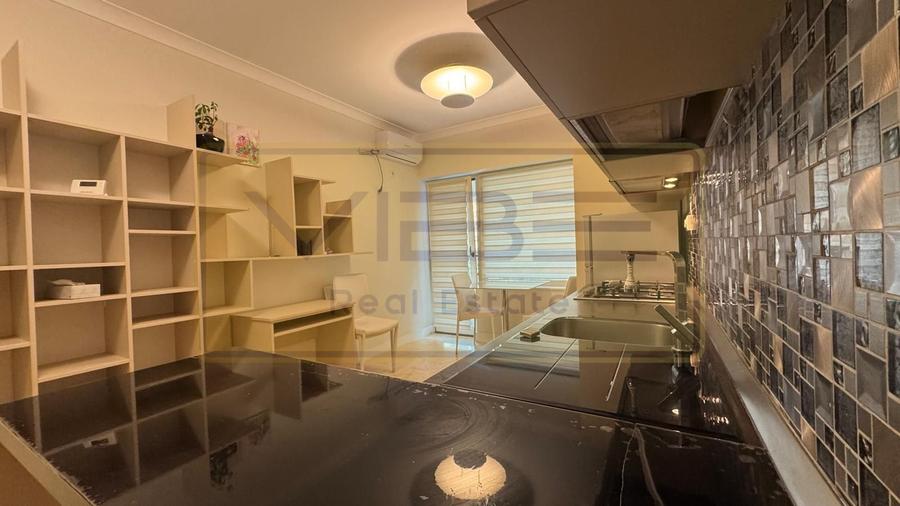 Apartament 2 camere + loc parcare Royal Town COPOU