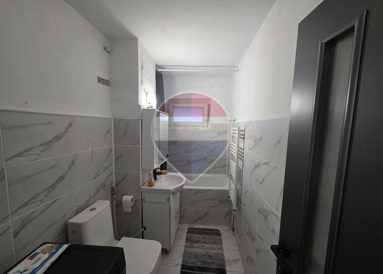 Apartament 2 camere parter inalt centrala gaz zona Dambovita