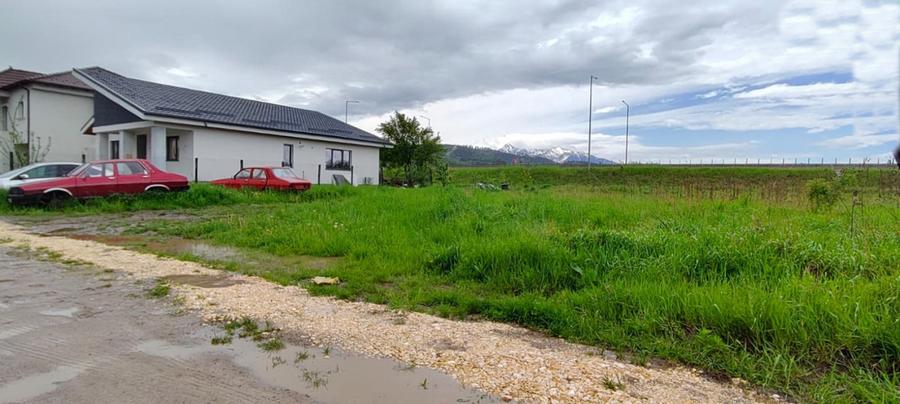 Teren cu utilitati si acces usor spre Brasov