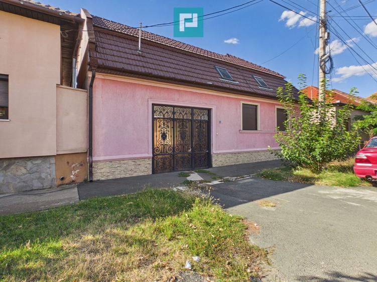 Casă individuală cu 5 camere și teren de 1.156 mp