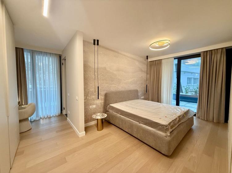 Parter cu gradina / Bloc boutique / 2 locuri de parcare