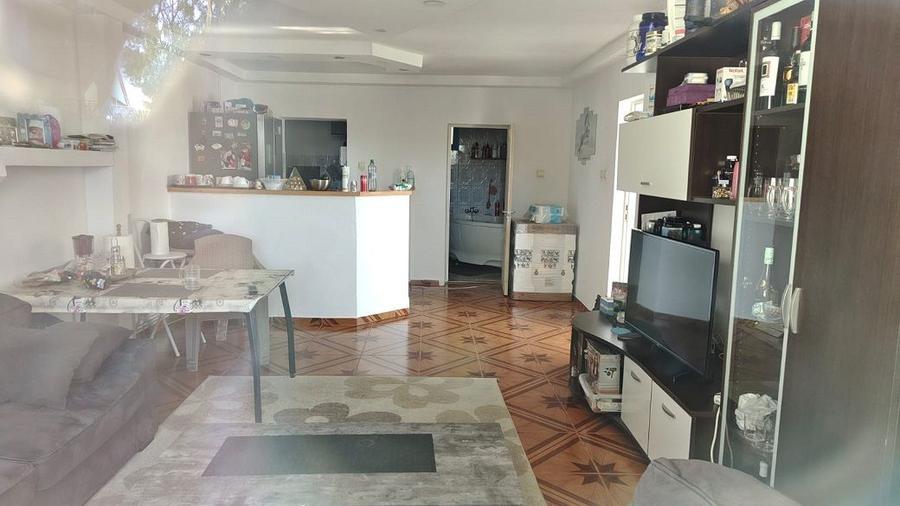Teren intravilan de 1560 mp, front de 26 m, cu casa S+P, in Grigorescu
