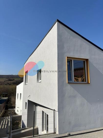 Casă cuplată modernă, 160 mp utili, semifinisată, curte amenajată