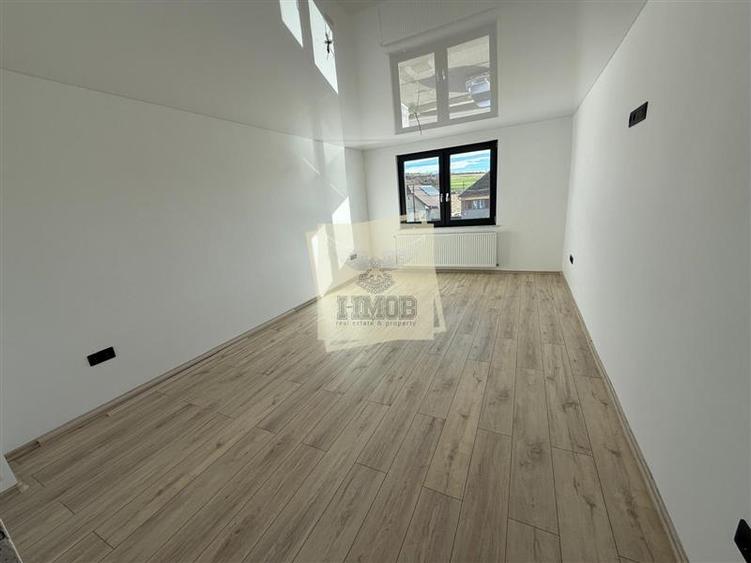 Casa cu 4 camere si 3 bai pretabila birouri in Sura Mare