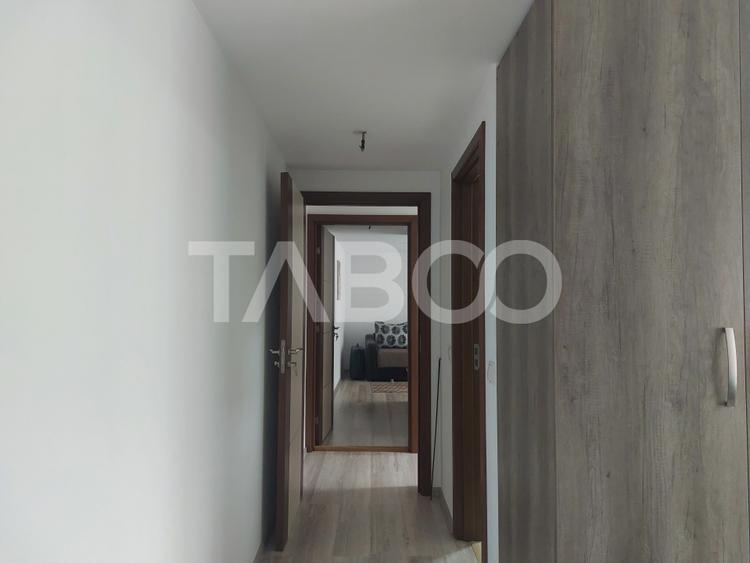 Casa in zona centrala 5 camere 2 bucatarii 3 bai curte comuna Cisnadie