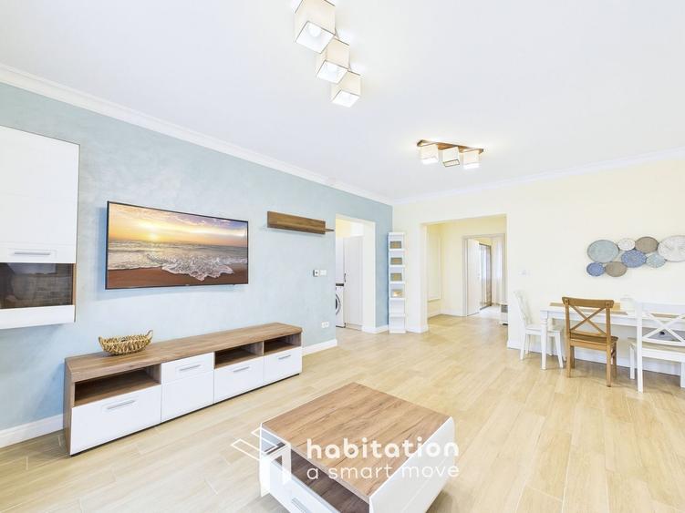 Apartament spațios cu curte și garaj – confortul unei case moderne