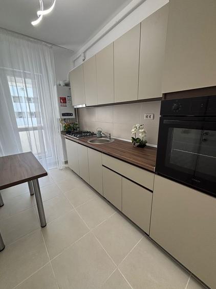 Garsoniera de inchiriat –Dotari: - TV + loc de parcare
