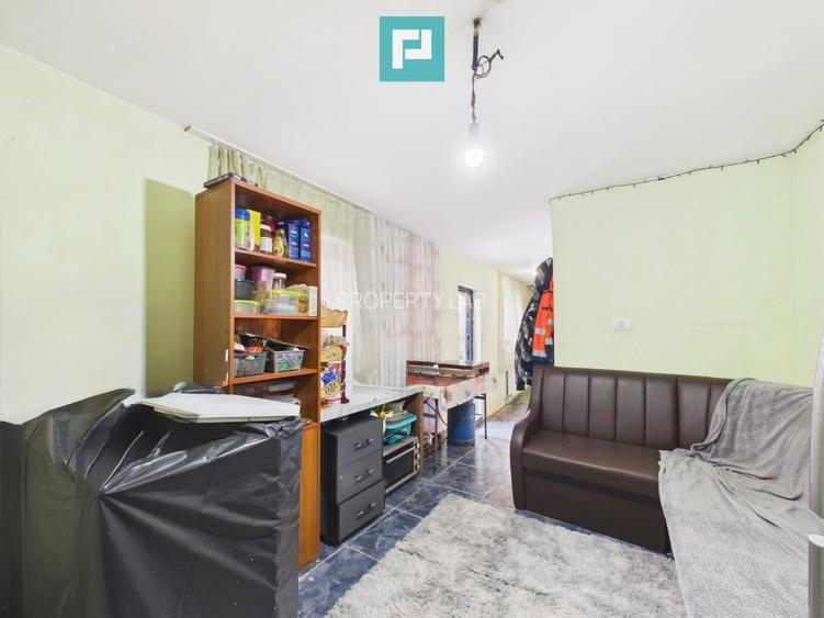 Casă P+E cu două apartamente, zona Drăgășani - 5